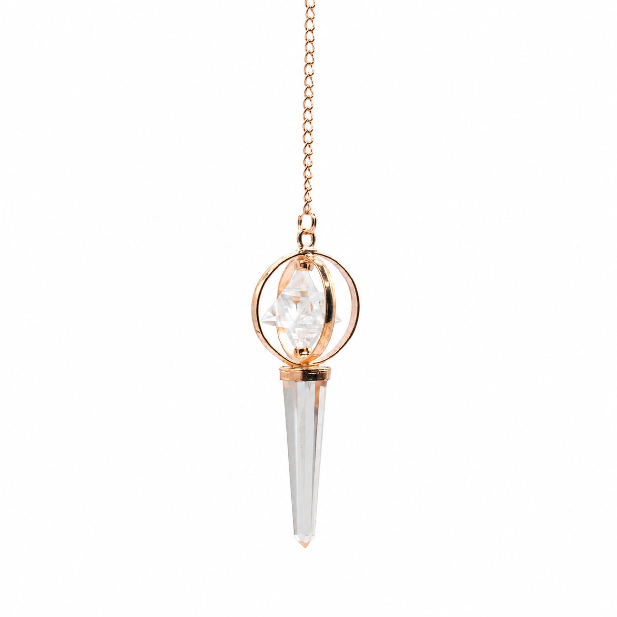 Pendule Merkaba en cristal de roche et cuivre avec étoile tournante. Un pendule divinatoire élégant pour les pratiques énergétiques.