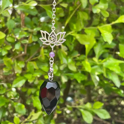 Pendule en pierre naturelle "Lotus & Om " Ozora